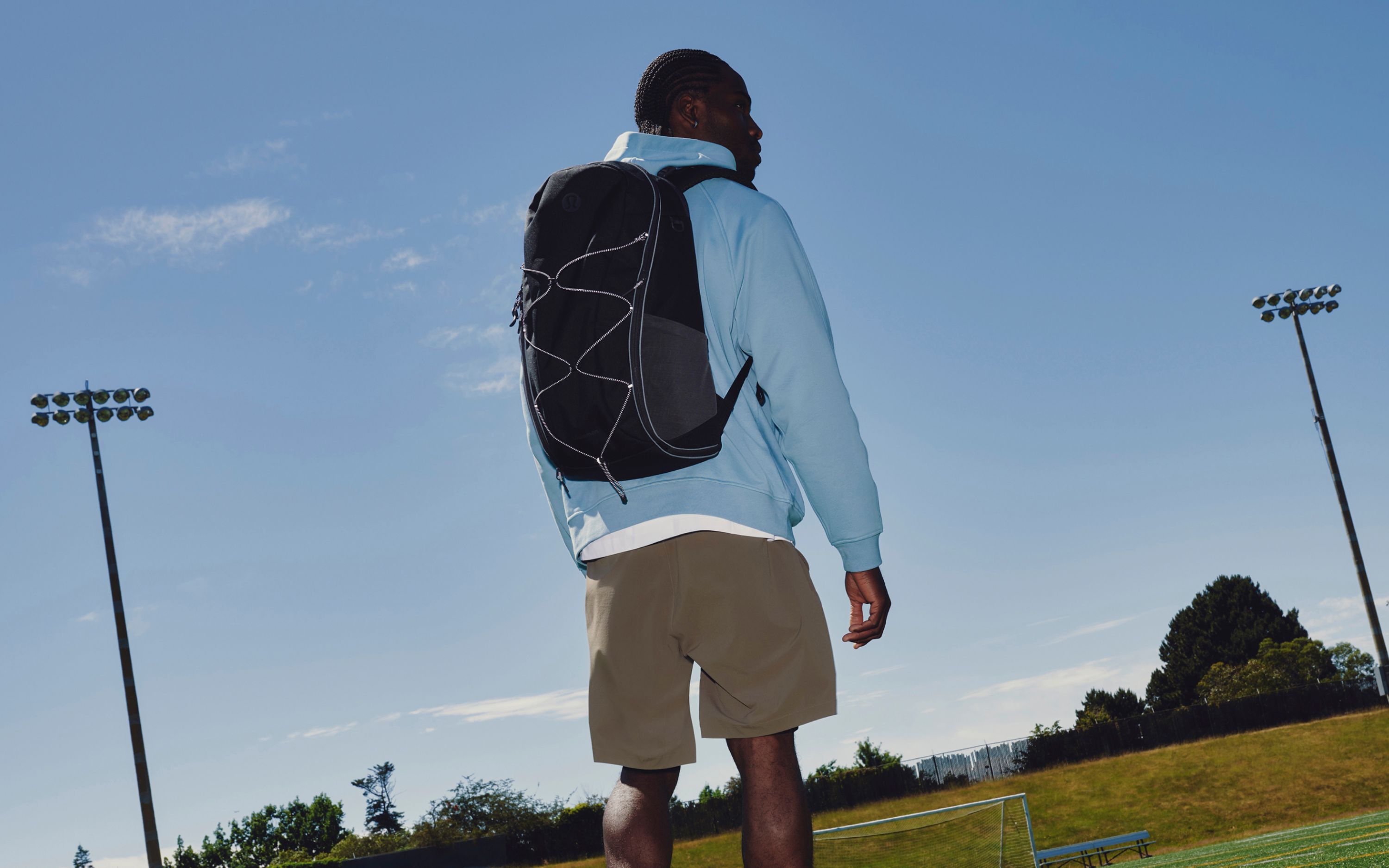 A person wears the lululemon Scuba Backpack 32L.