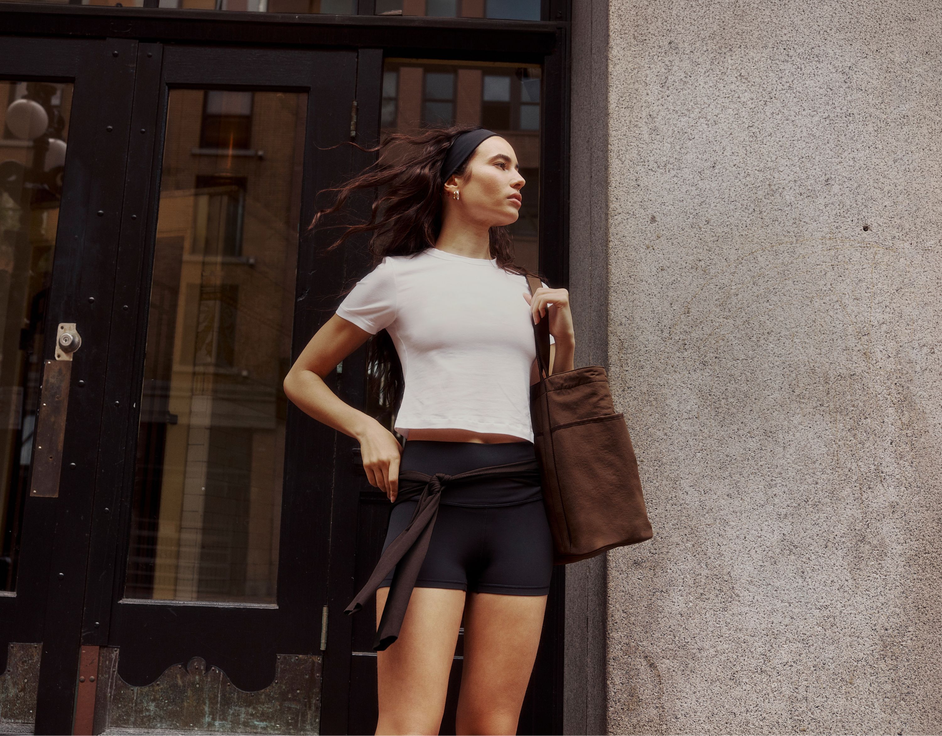 A person wears the lululemon Align No Line™ Short 4” and Little Tee.