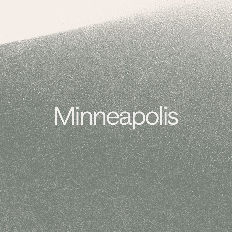 Abstract graphic with a grey gradient. A text overlay reads: Minneapolis."