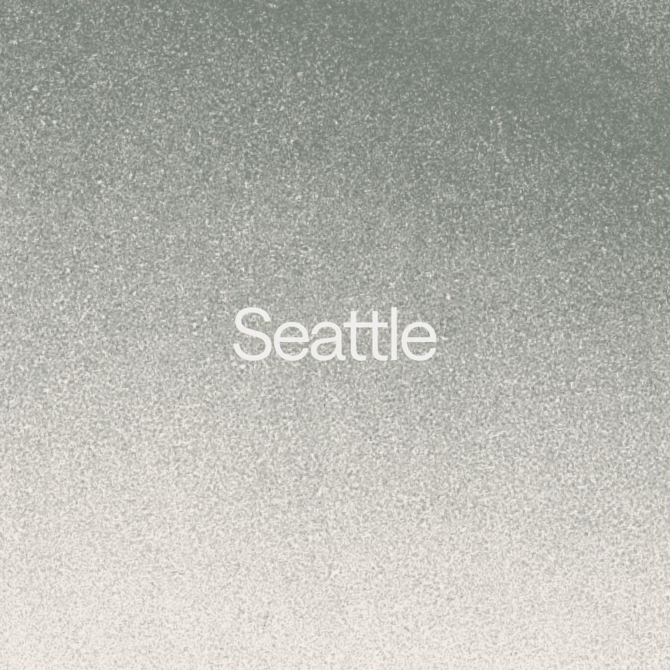 Abstract graphic with a grey gradient. A text overlay reads: "Seattle."