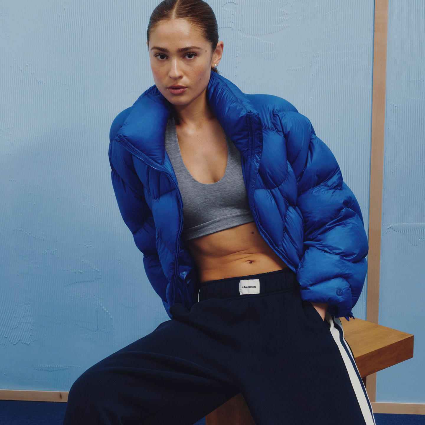 A person wears the Featherweight Cropped Quilted Puffer.