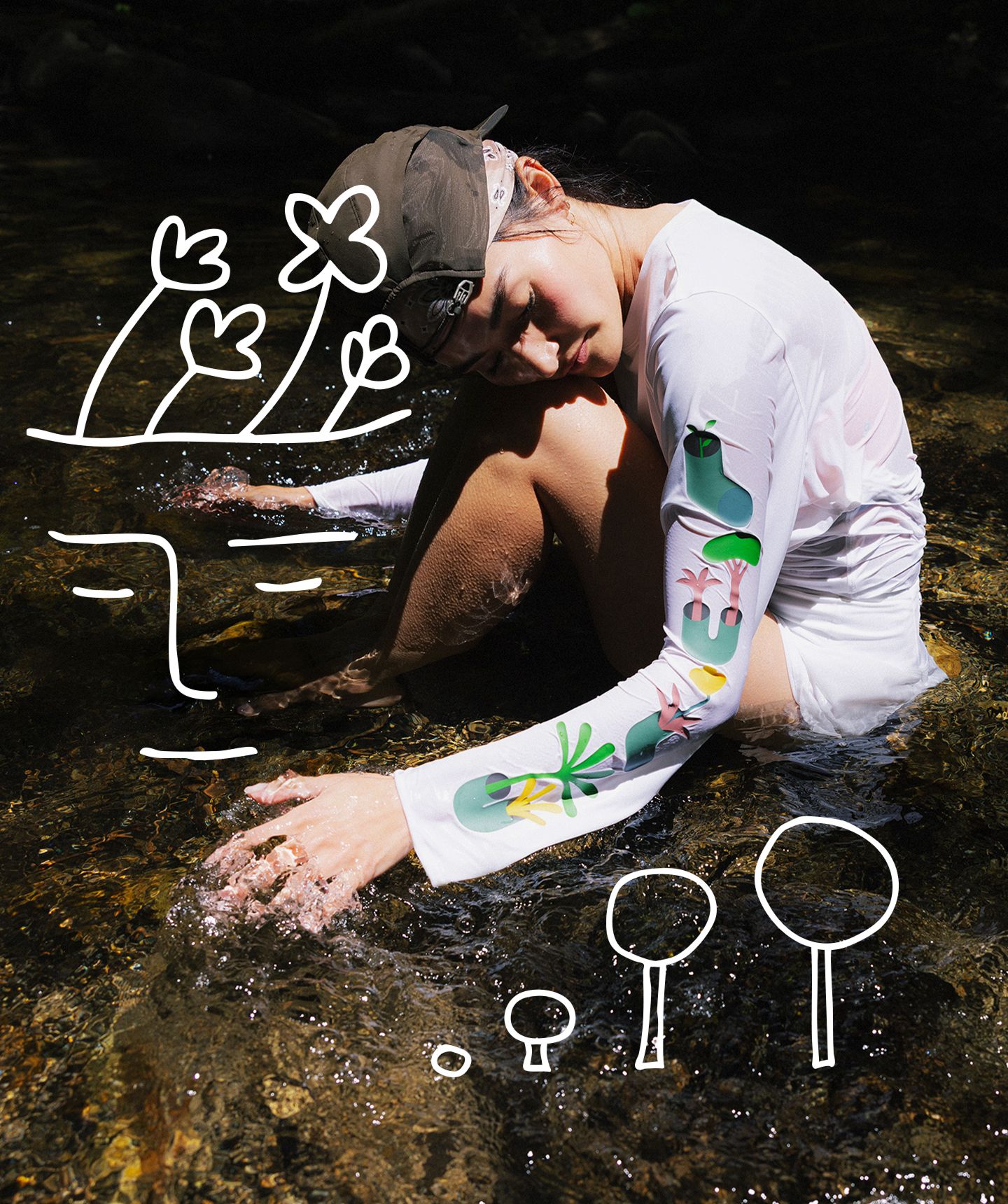A person wears the lululemon x Geoff McFetridge collaboration featuring on-image drawings.