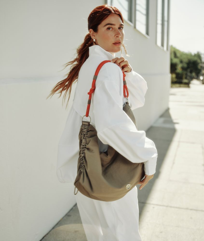 Carries the outfit, too — Bags