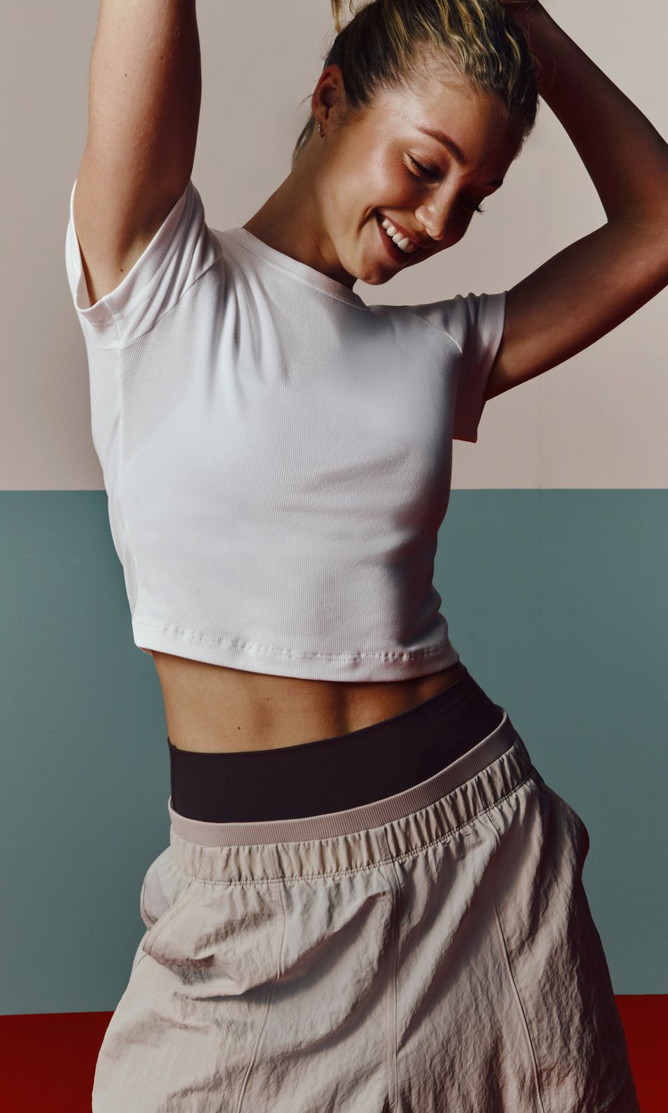 A person wears the lululemon Little Ribbed Tee.