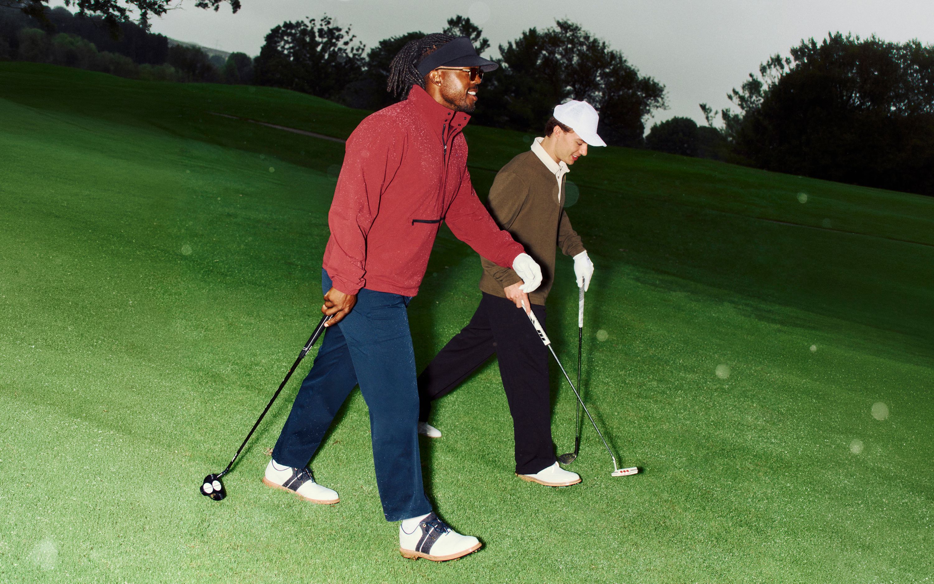 Professional Hockey Player Connor Bedard hits the course with Golf Advocate Roger Steele in new lululemon golf gear.
