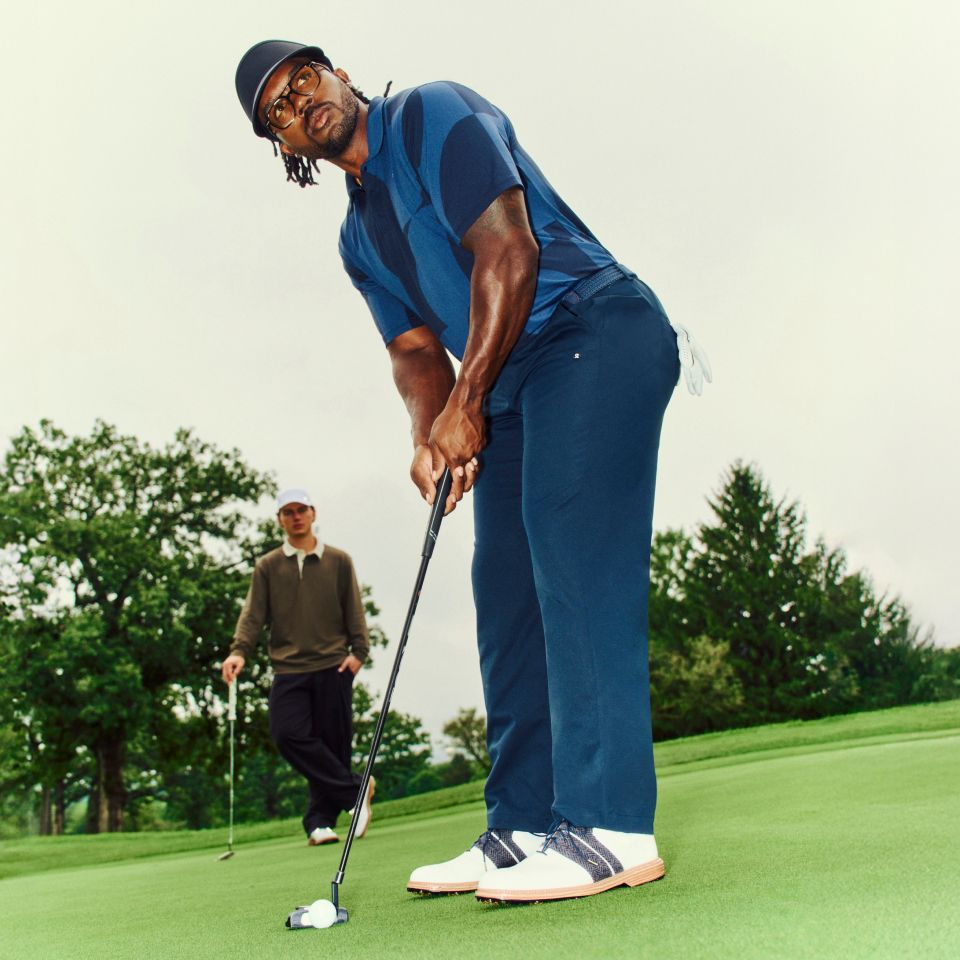 Golf Advocate Roger Steele plays in the lululemon Logo Sport Polo and Water-Repellent Classic-Fit Golf Pant.