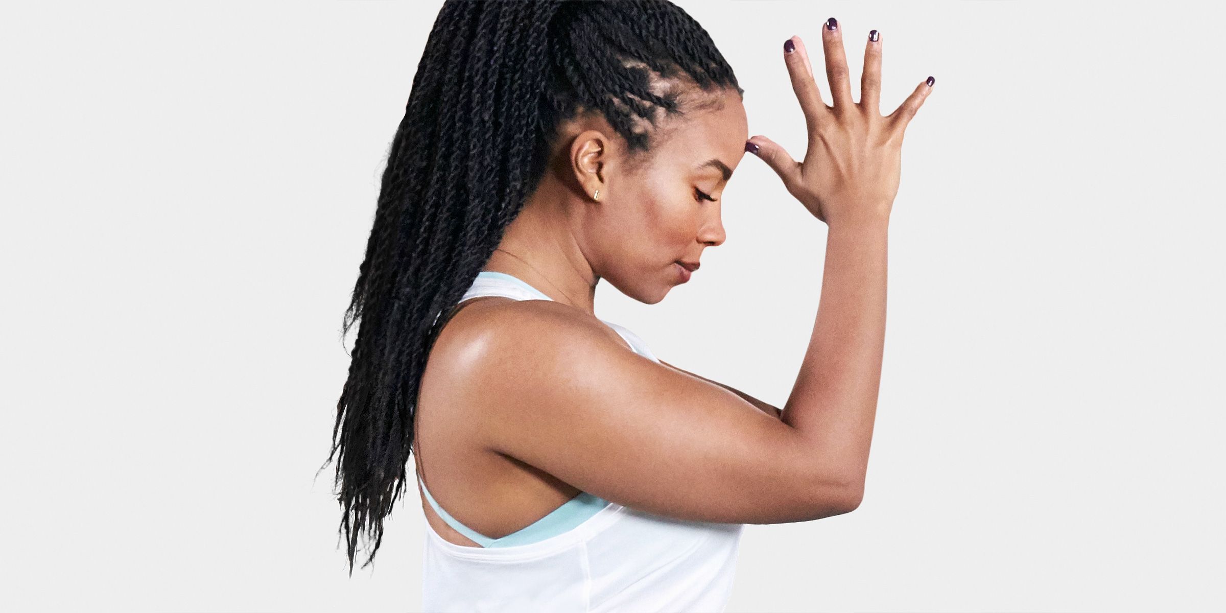 Global Yoga Ambassador Chelsea Jackson with hands in prayer