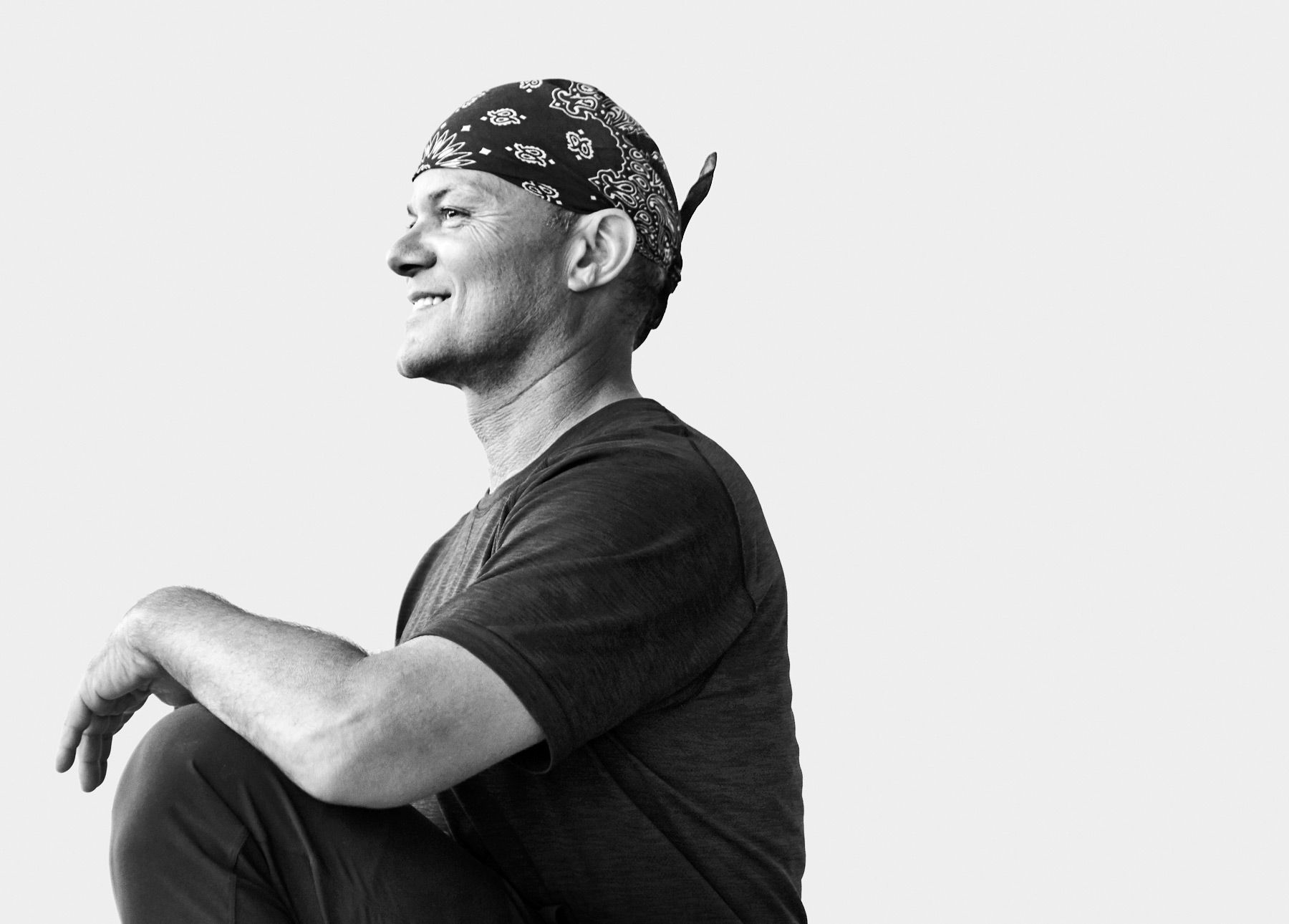 Global Yoga Ambassador Baron Baptiste smiling side profile