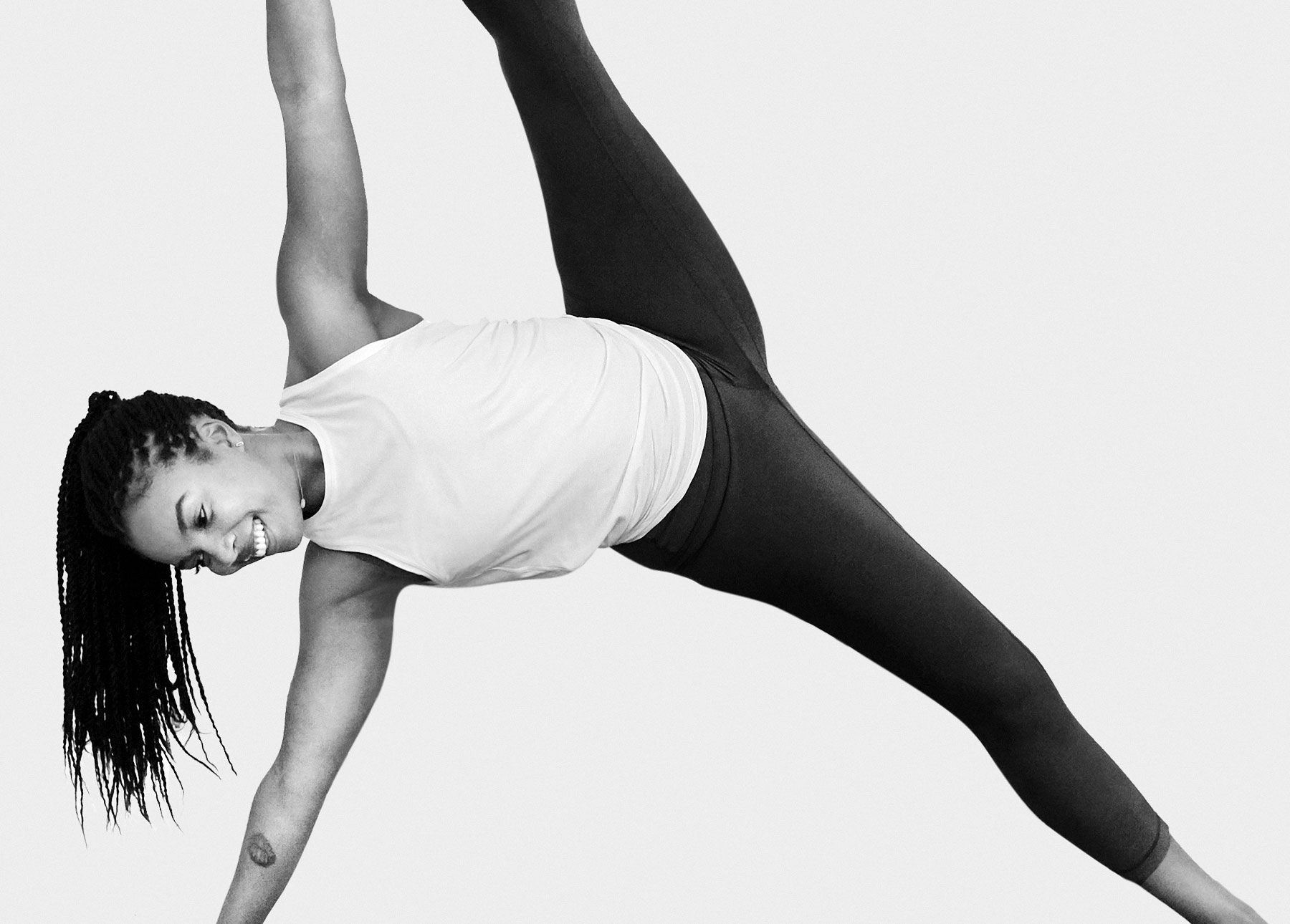 Chelsea Jackson Roberts in extended side plank pose