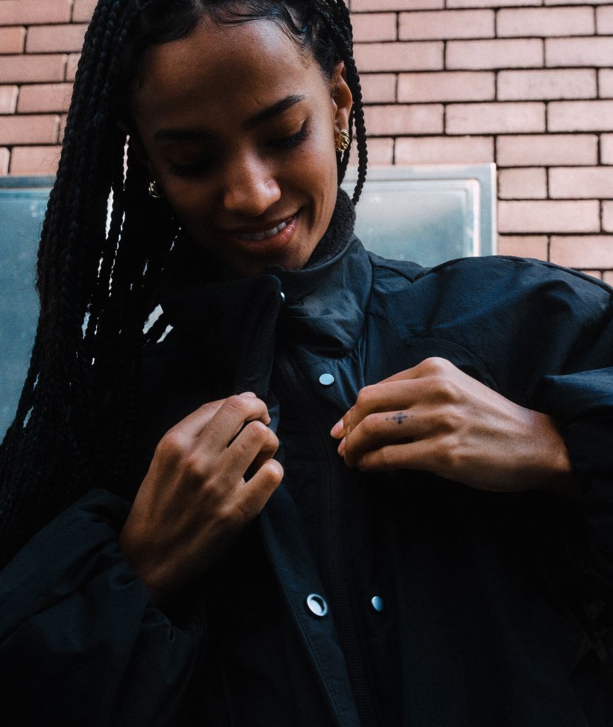 Woman wearing lululemon Water-Resistant Fleece-Lined Jacket