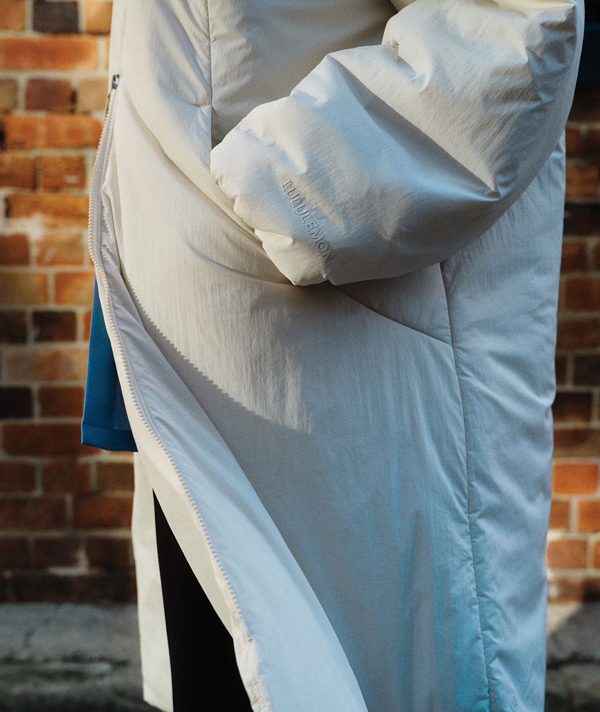 Woman wearing lululemon ThermoZen Insulated Long Jacket