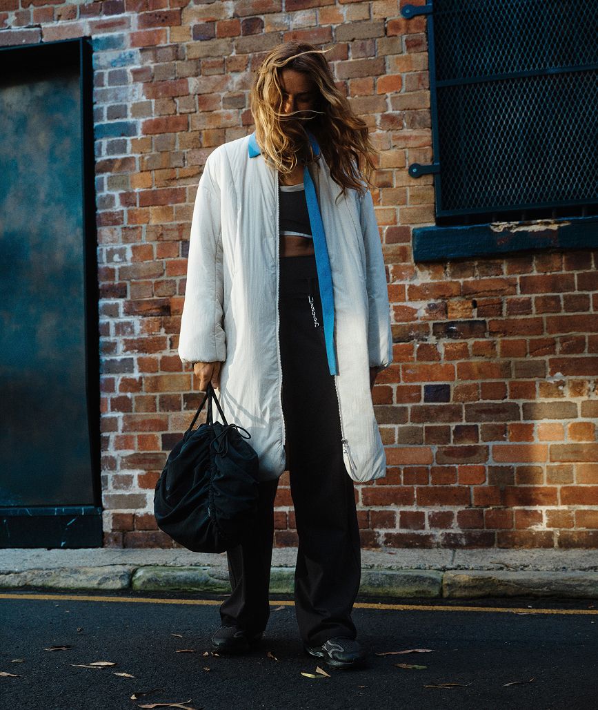 Woman wearing lululemon Thermozen Jacket