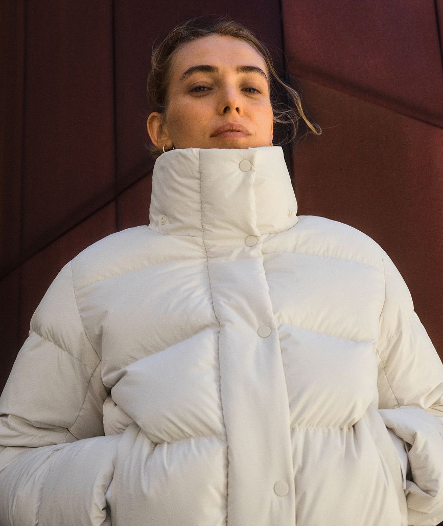 Woman wearing lululemon Wunder Puff Jacket