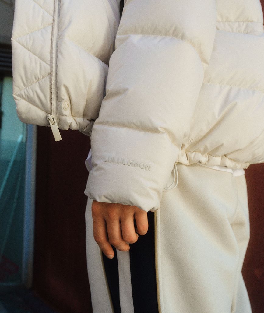 Woman wearing lululemon Wunder Puff Jacket