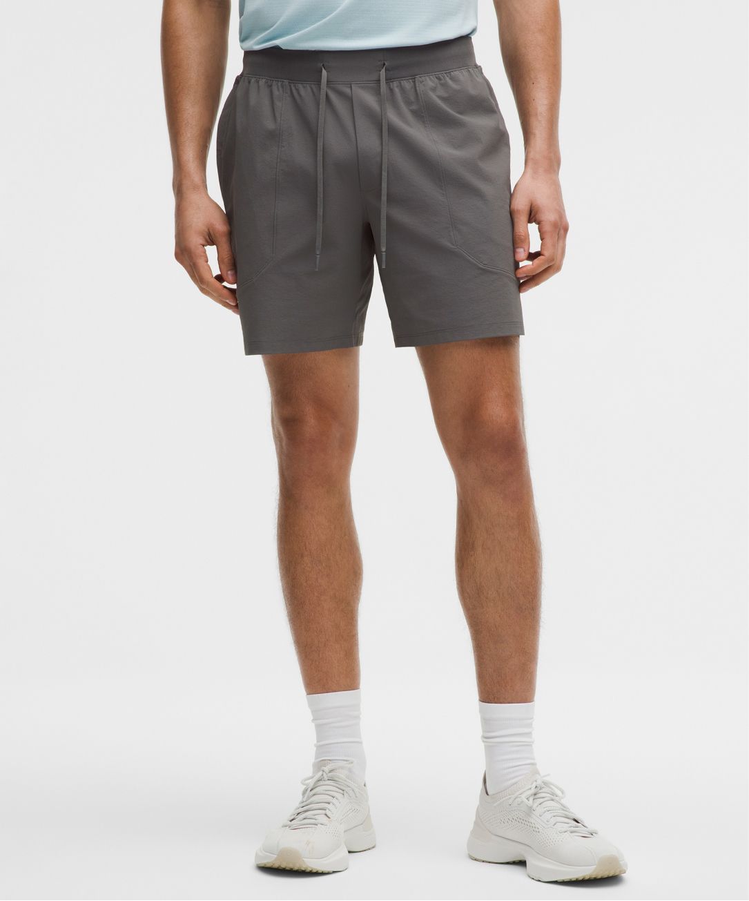 A person wears License to Train Shorts from lululemon.