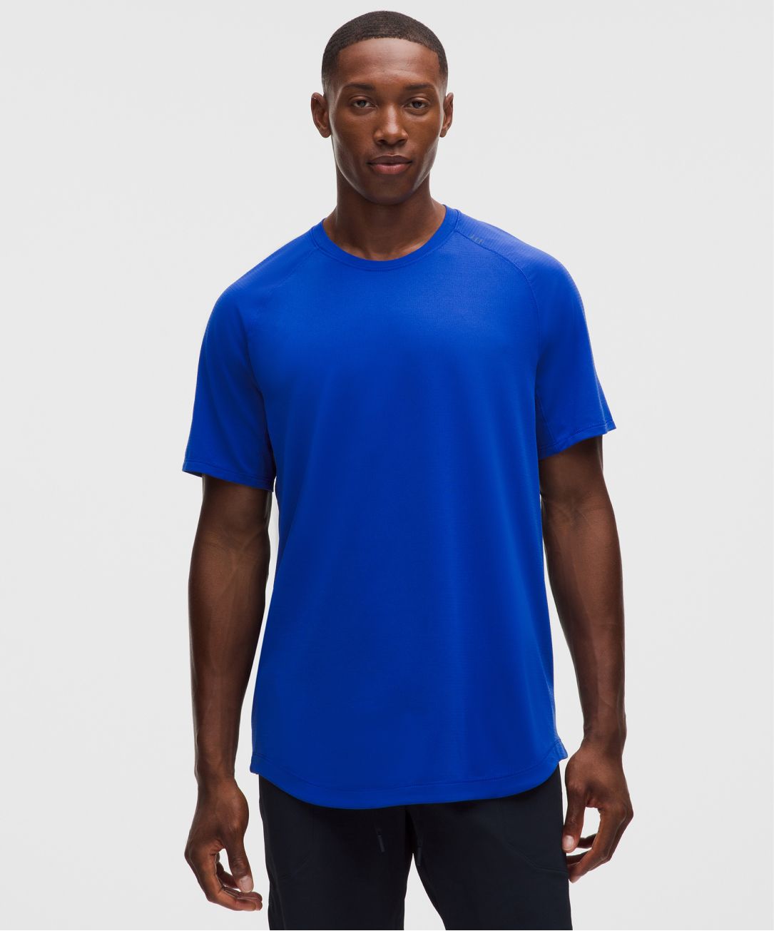 A person wears a License to Train Short-Sleeve Shirt from lululemon.
