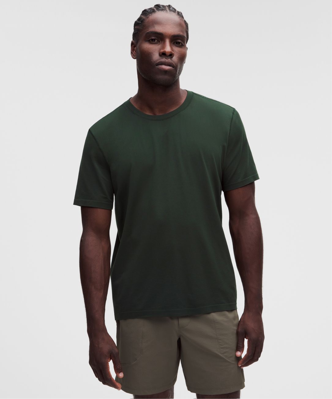 A person wears a Metal Vent Tech Short-Sleeve Shirt from lululemon.