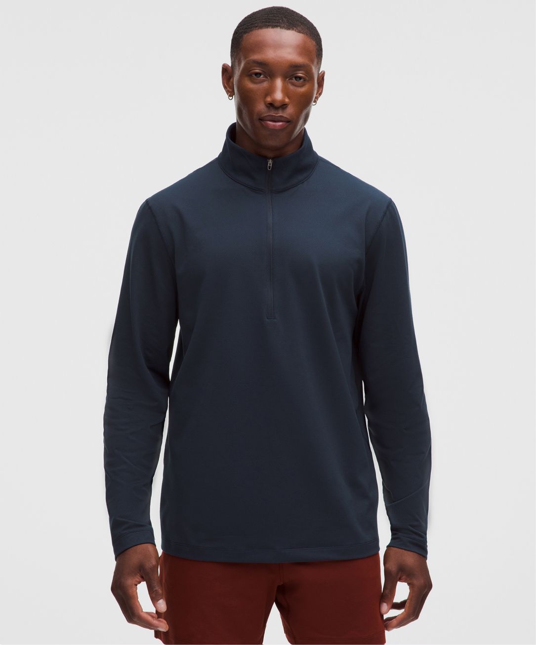 A person wears the Mesh Soft Jersey Half Zip from lululemon.