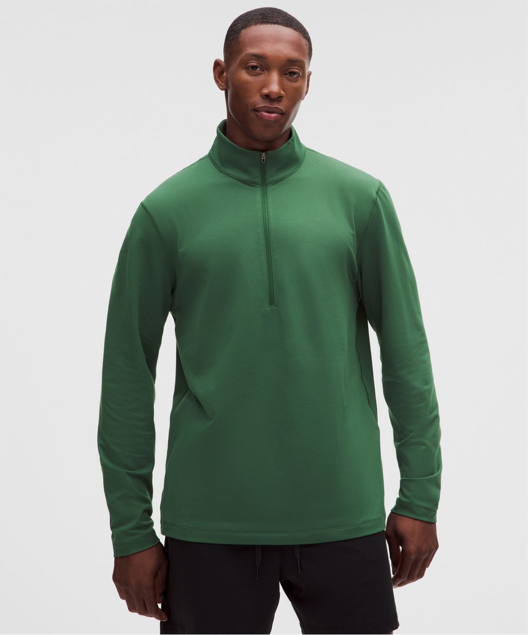 A person wears the Soft Jersey Half Zip from lululemon.