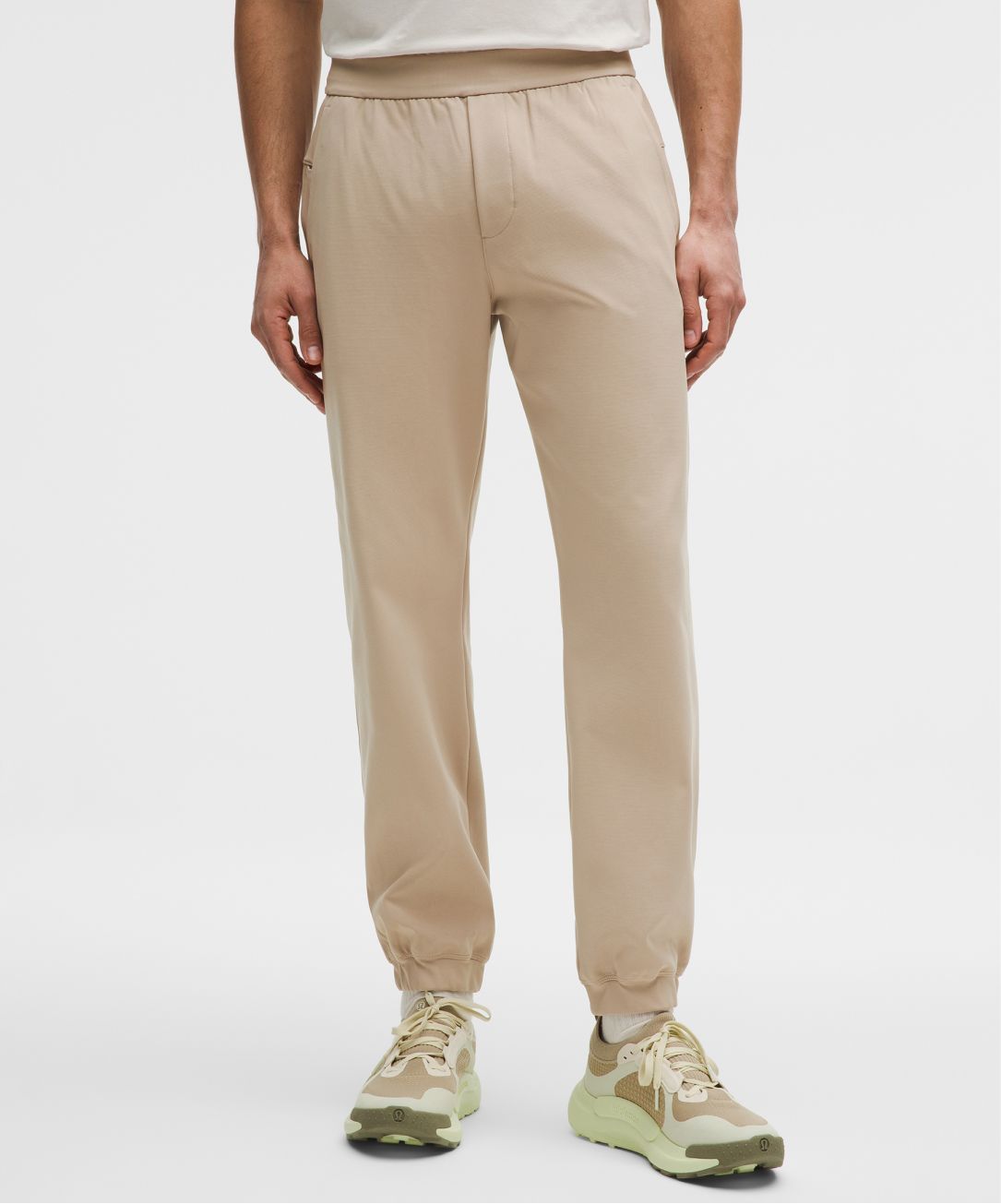 A person wears the Sojourn Jogger from lululemon.