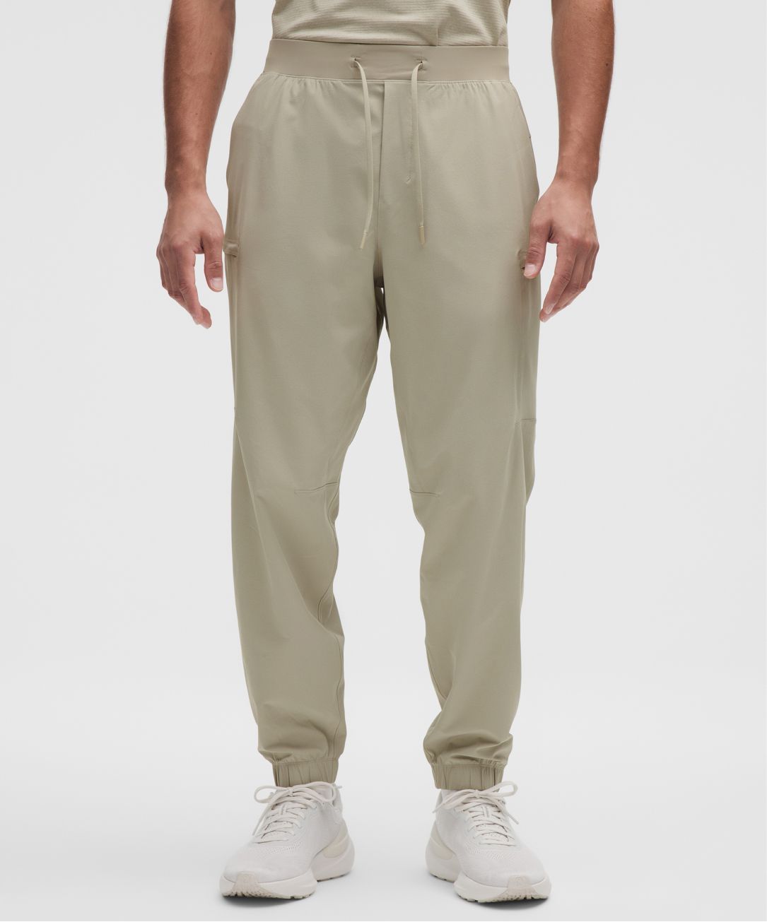 A person wears the Zeroed In Classic-Fit Cargo Joggersfrom lululemon. 