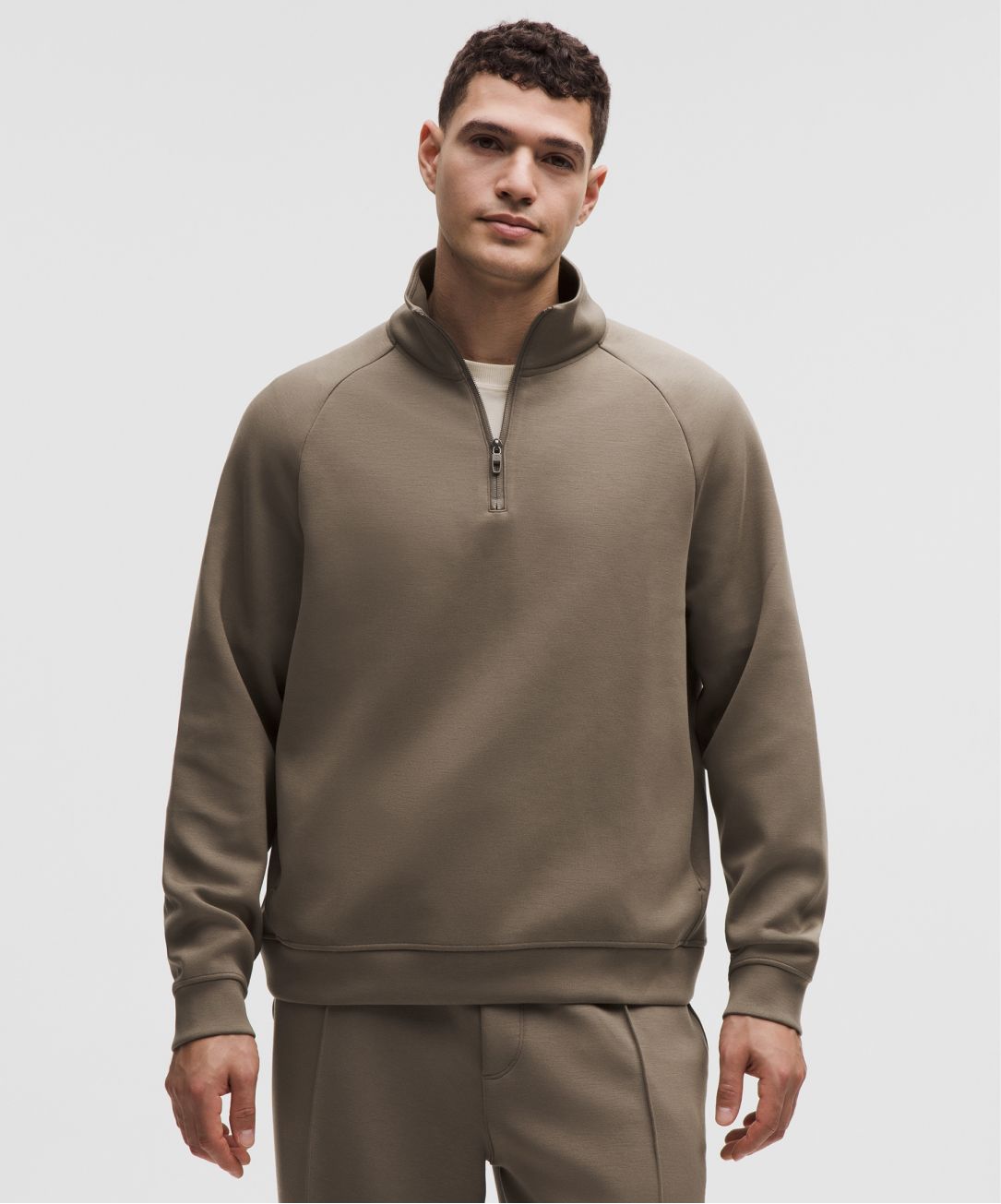 A person wears the Smooth Spacer Quarter Zip from lululemon.