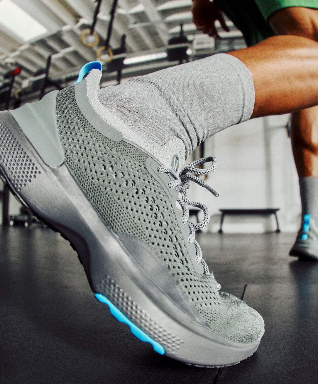 A close-up of the Chargefeel 3 Workout Shoe on a person’s foot in a gym.