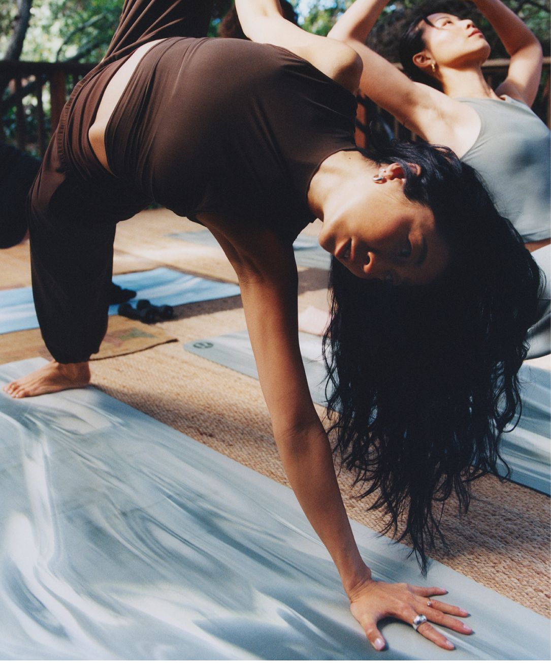 Yoga instructor Mai Izumitani practices yoga in the Nulu™ and Mesh Overlay Crop Studio Tank and Align Foldover Relaxed Jogger.