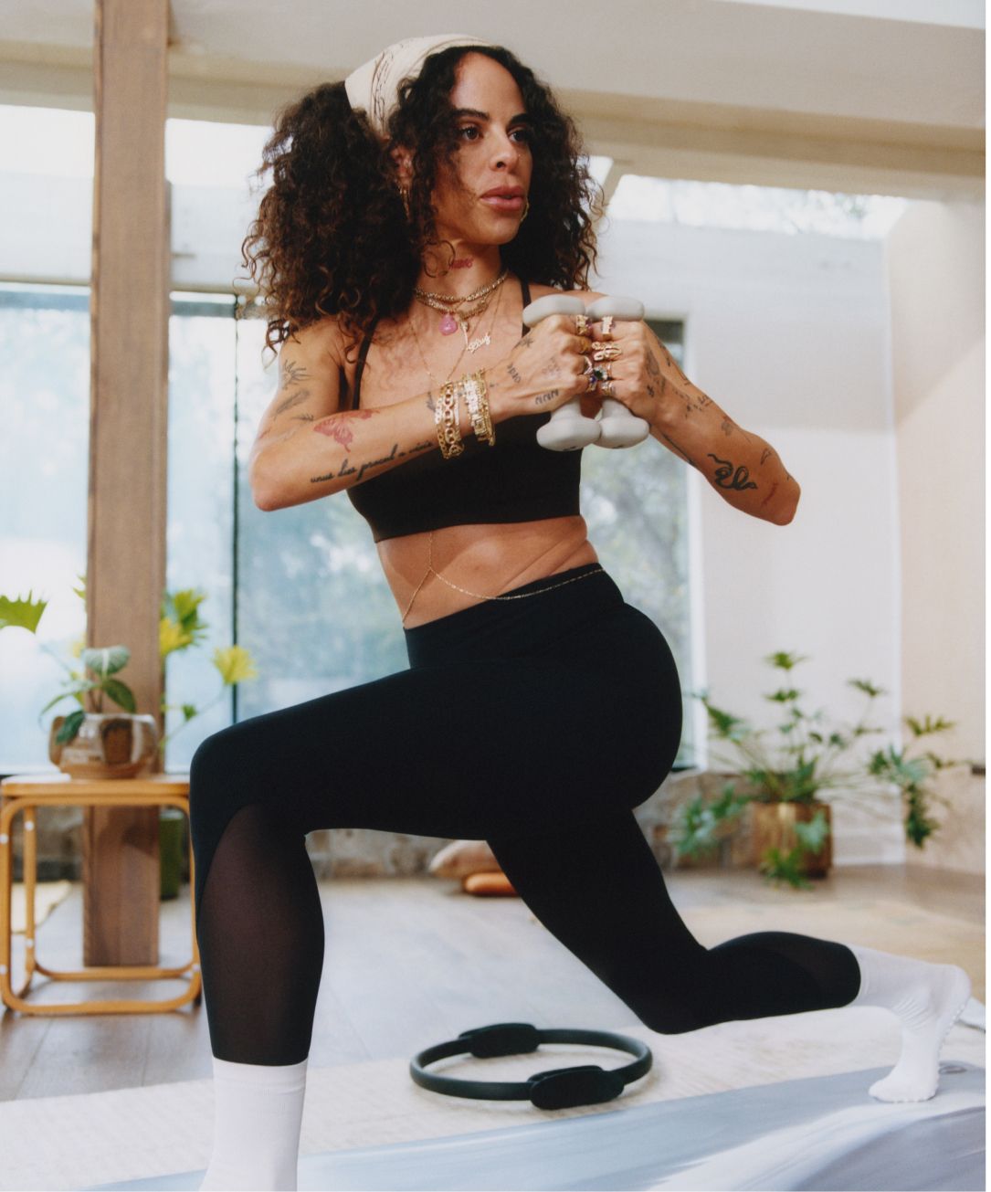Peloton instructor Johanna Ricouz practices Pilates in the Flow Y Bra and Nulu™ and Mesh No Line High-Rise Studio Tight.