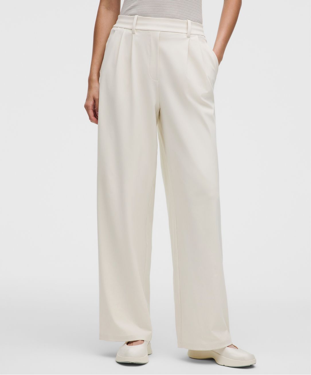 A person wears a DayDrift pant from lululemon.