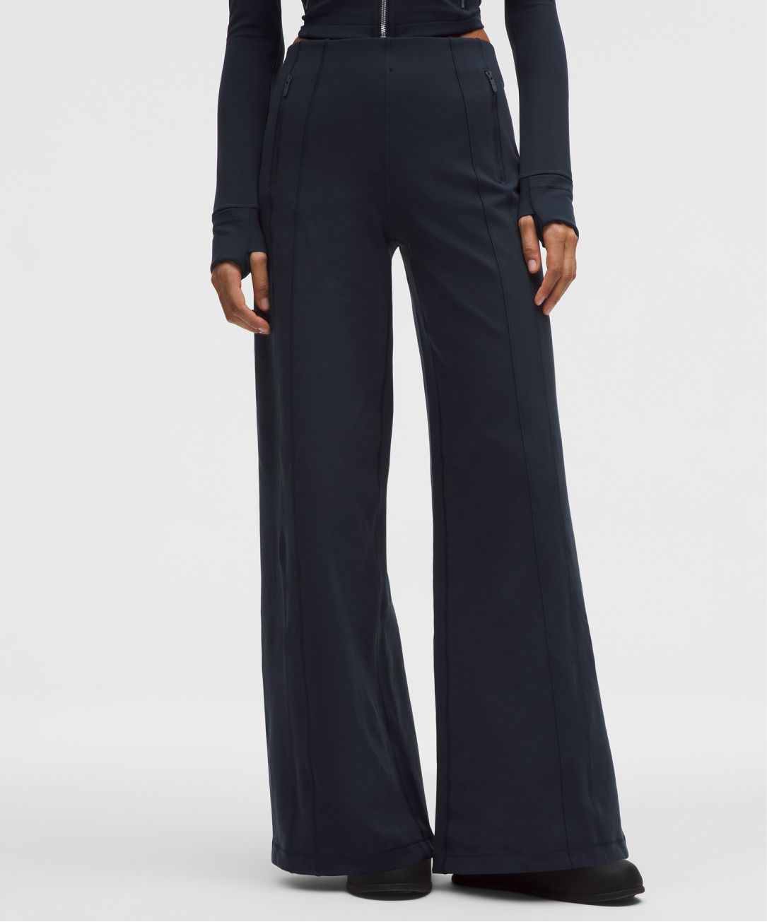 A person wears a Define pant from lululemon.