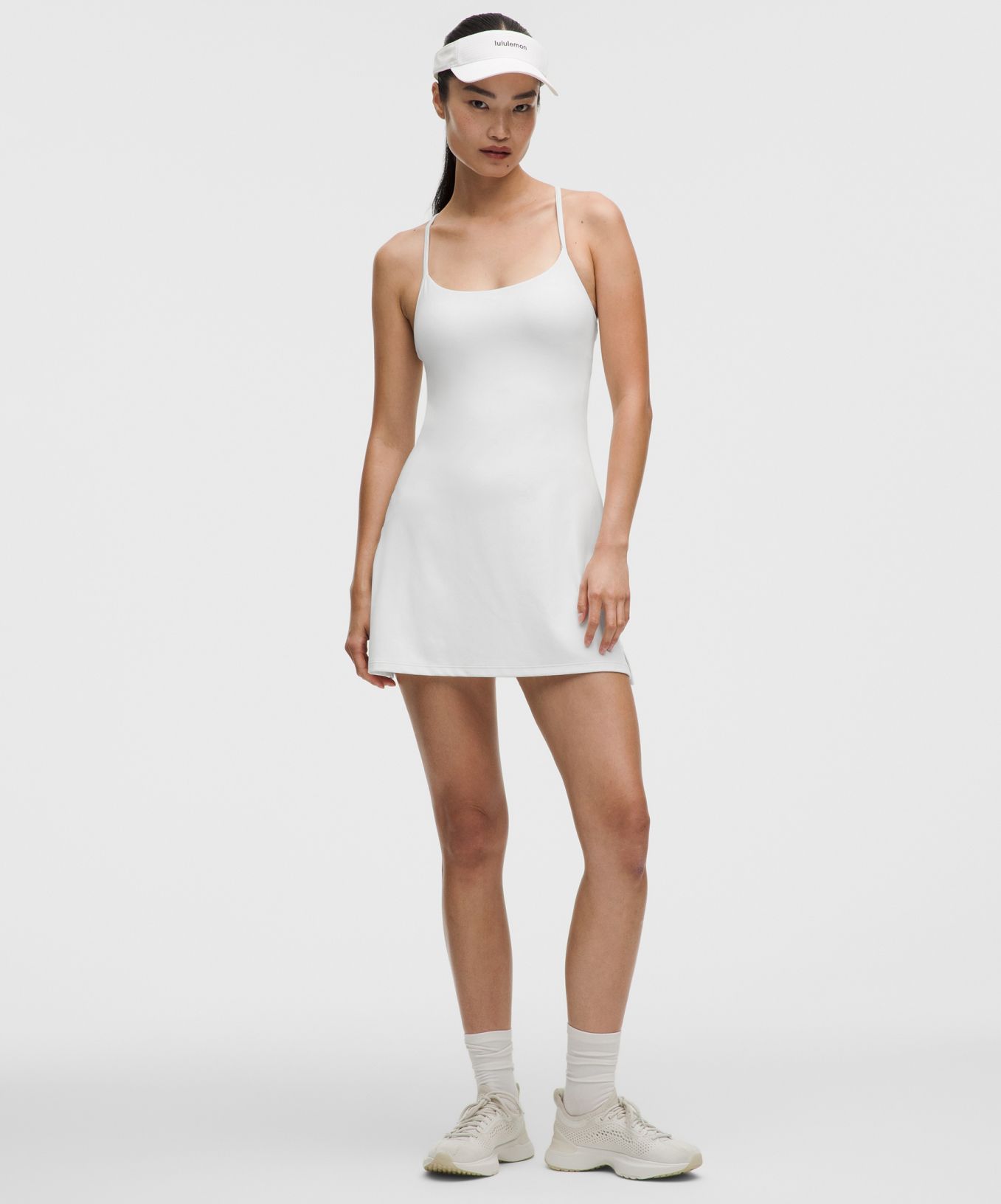 A person wears an athletic dress from lululemon.