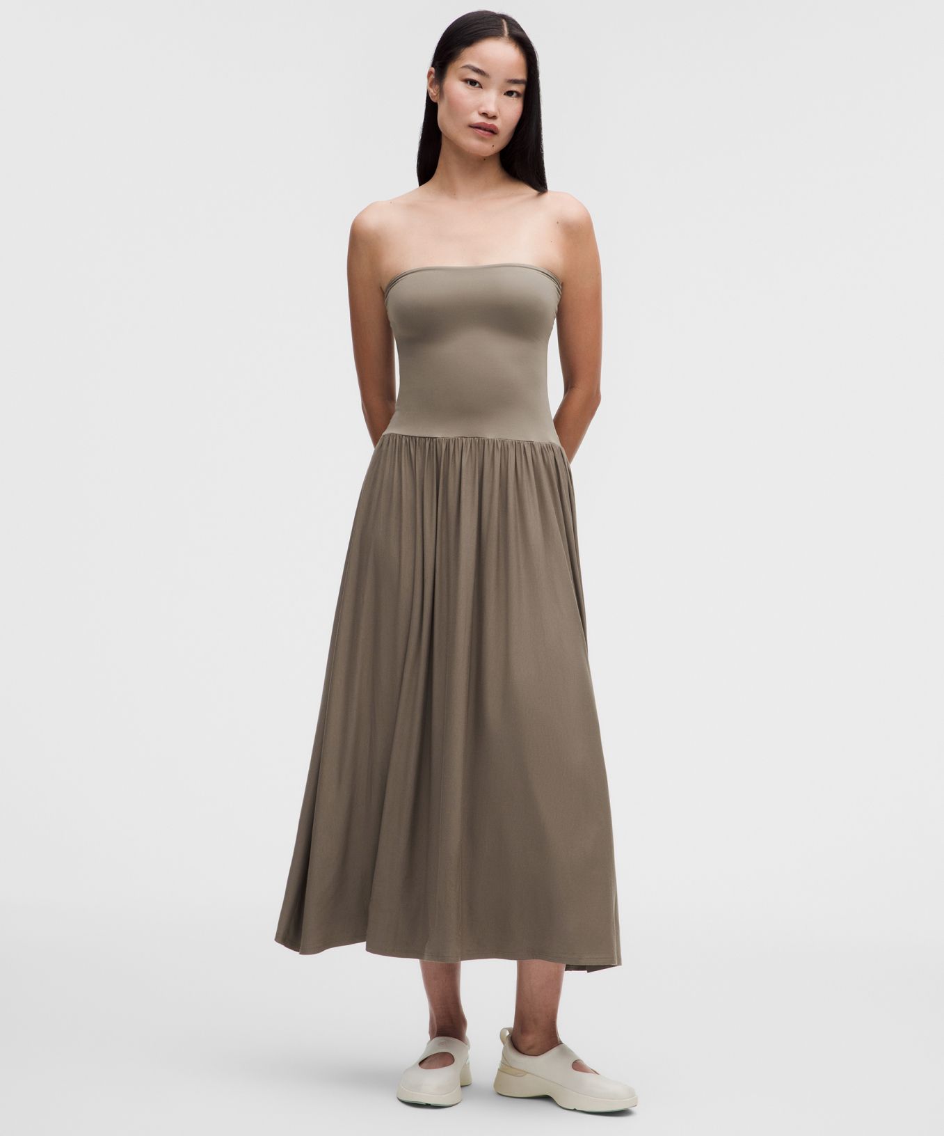 A person wears a bestselling dress from lululemon. 