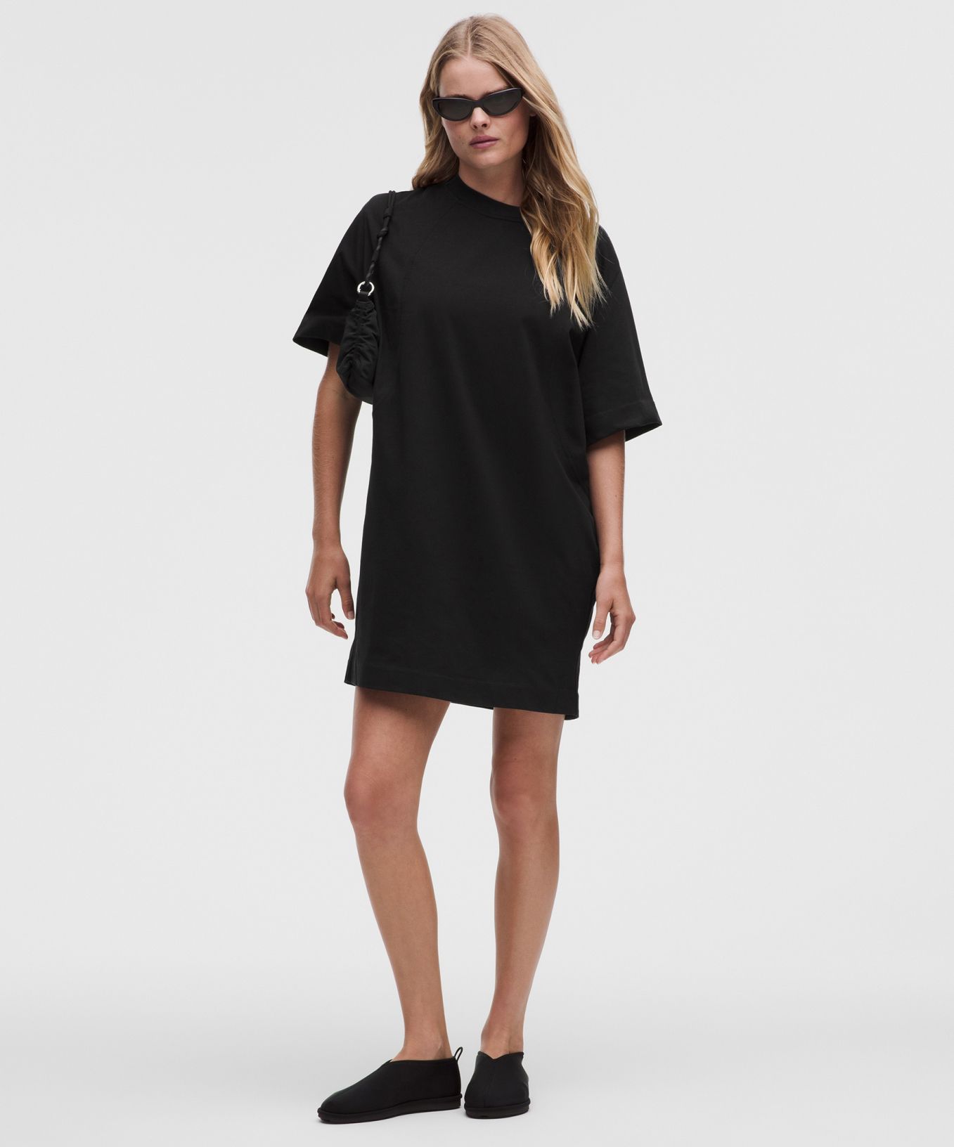  A person wears a casual dress from lululemon. 