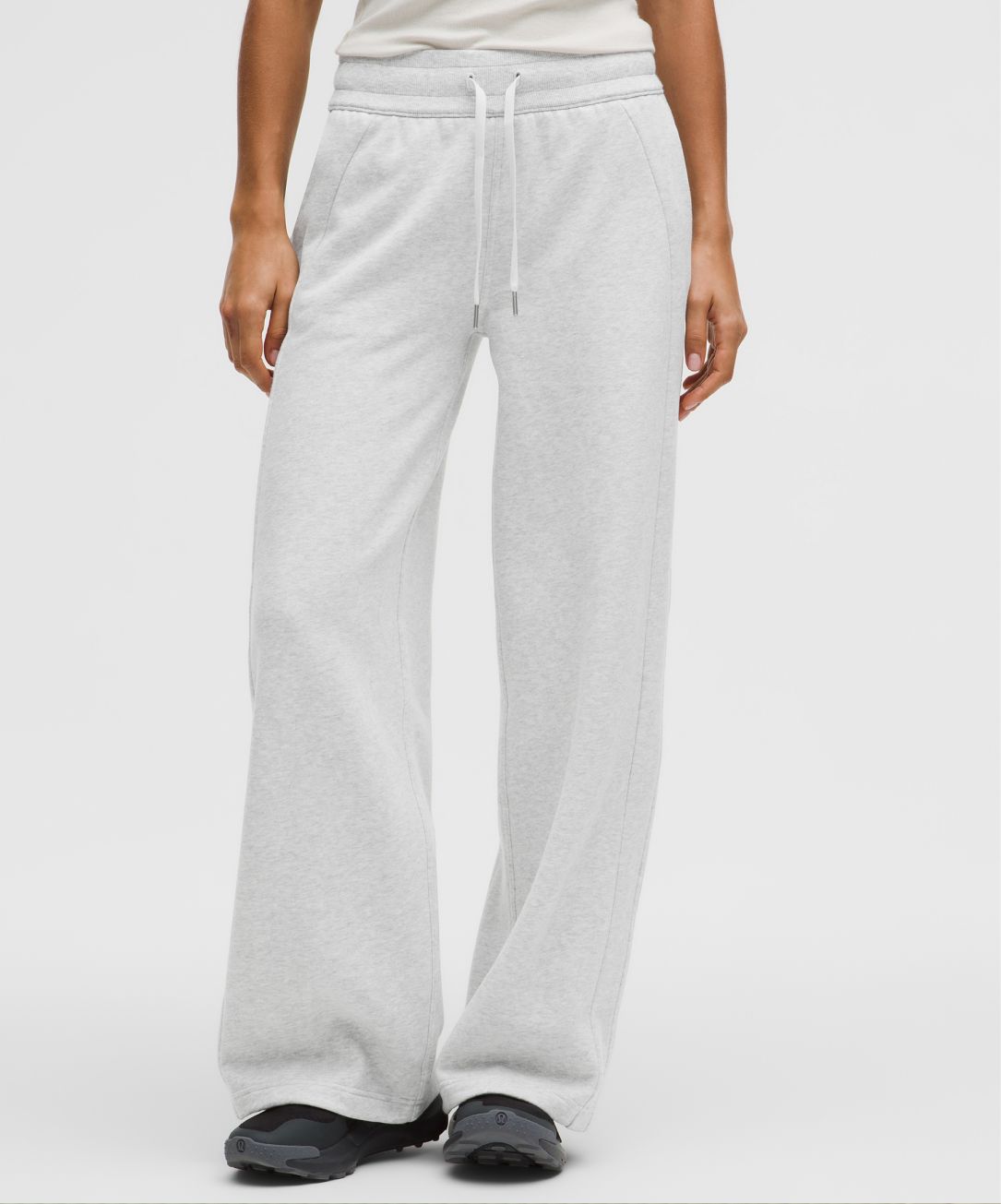 A person wears a Scuba Evolve pant from lululemon.