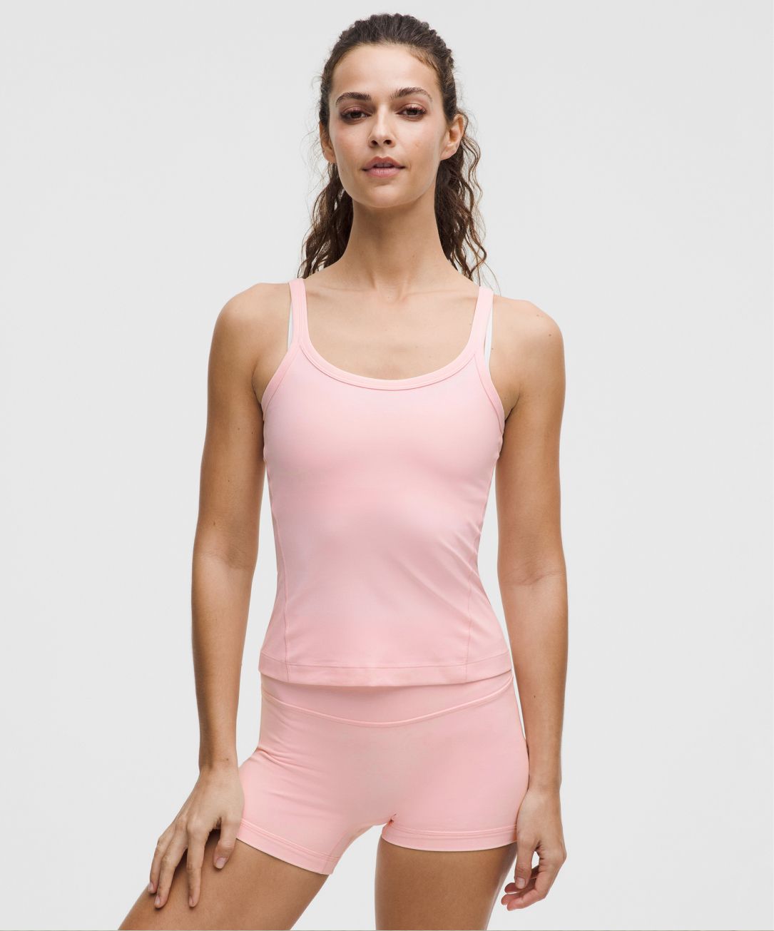 A person wears an Align tank top from lululemon. 