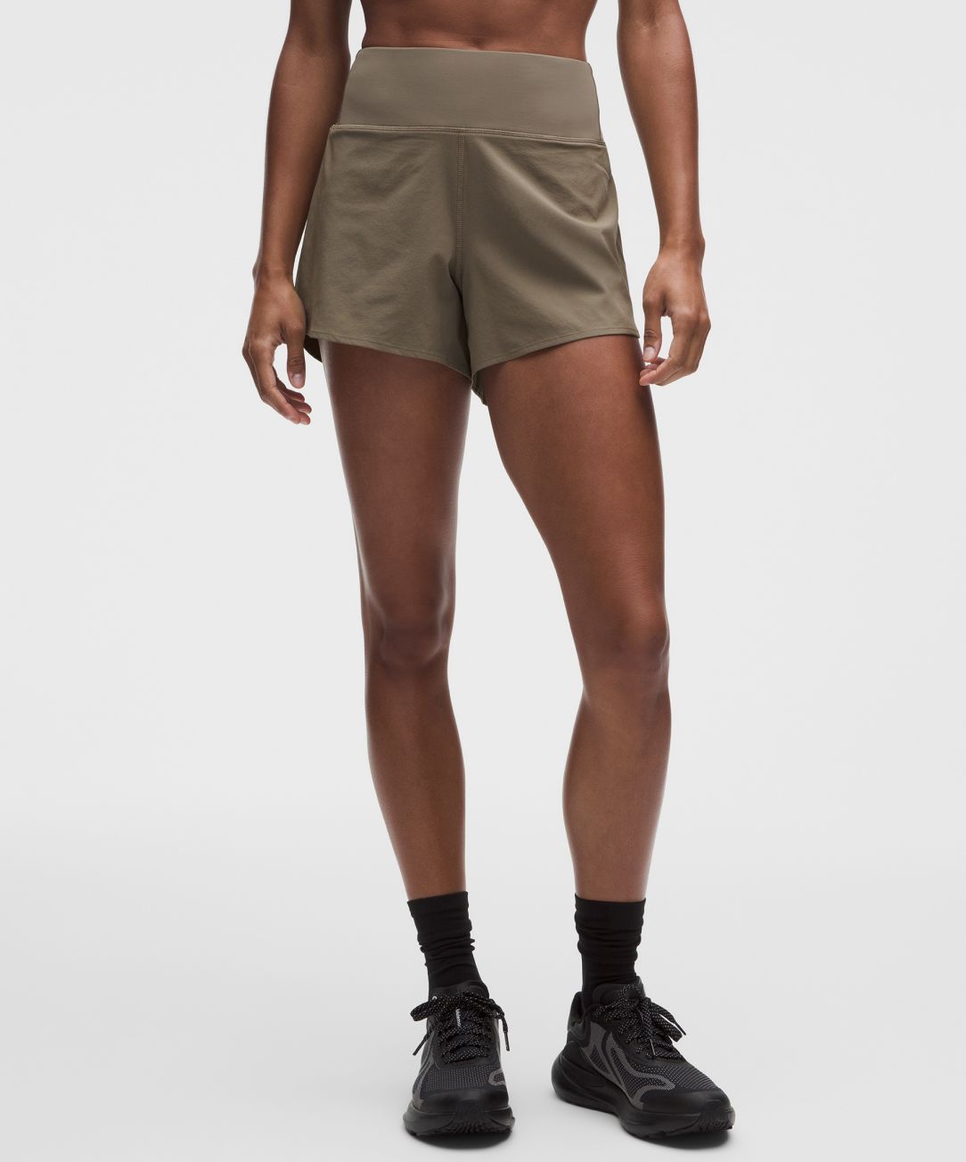 a person wears lululemon Speed Up Shorts