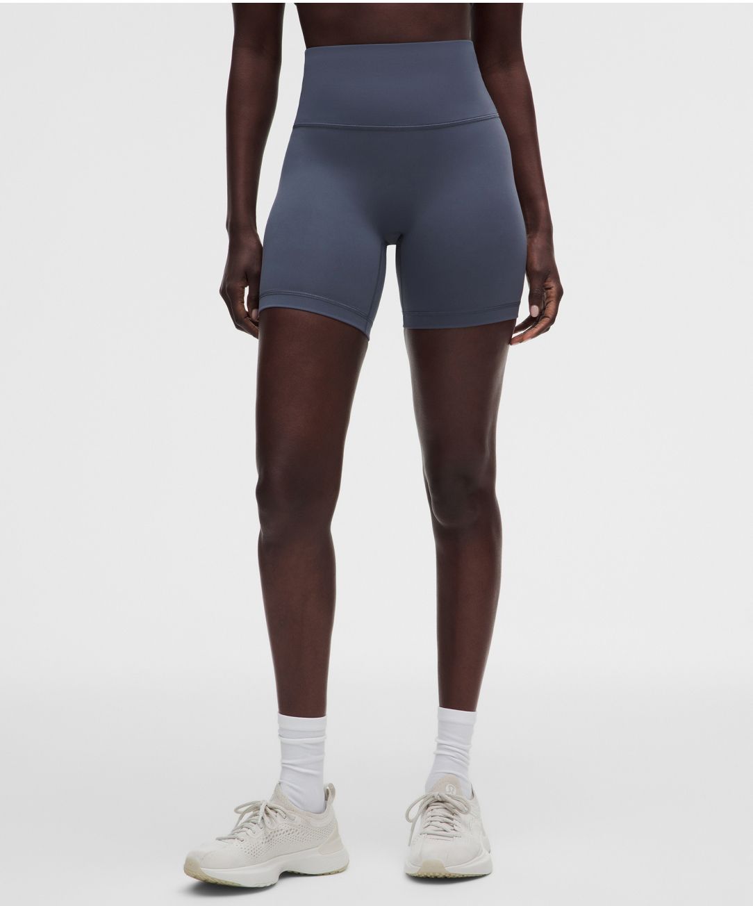 a person wears lululemon Wunder Train Shorts